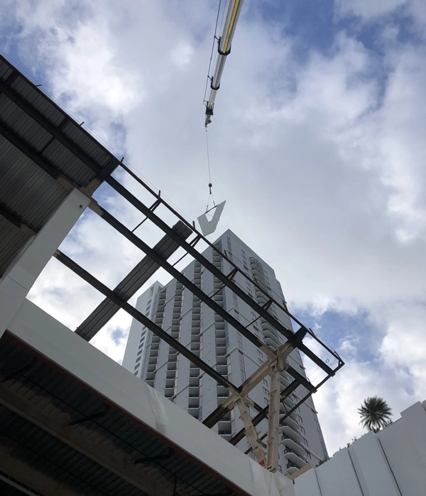 Architectural precast façade panel installed by Concrete Erectors, Inc. on high-rise structure
