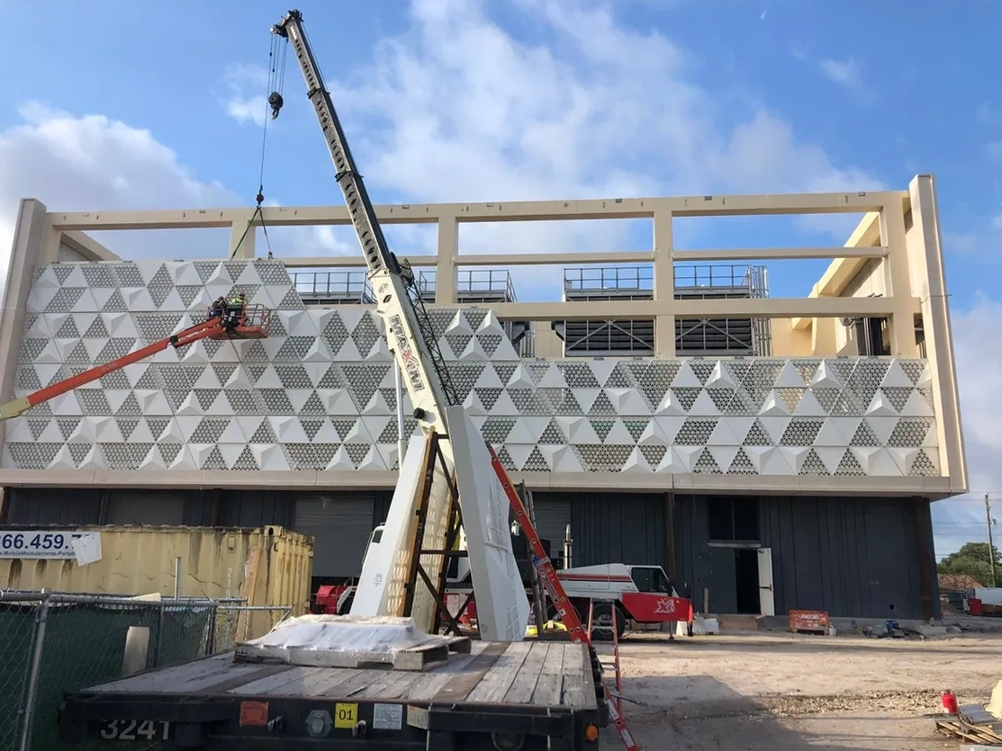 GFRC facade panel installation by Concrete Erectors, Inc