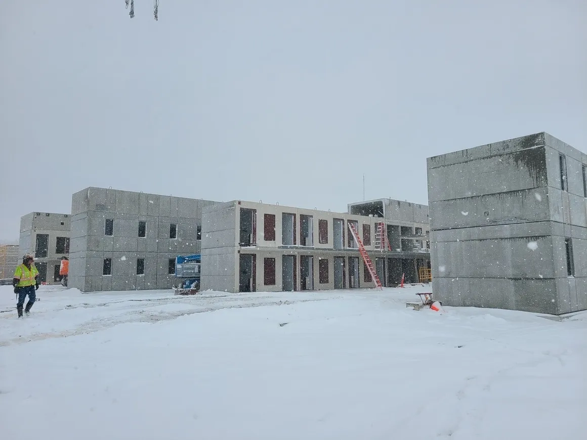 Precast concrete installation for modular prison cells during winter by Concrete Erectors, Inc Precast concrete installation for modular prison cells during winter by Concrete Erectors, Inc