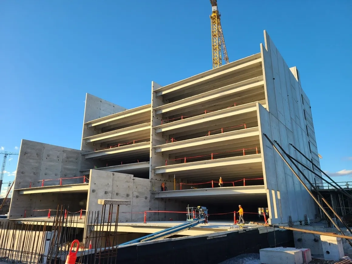 Precast concrete parking garage under construction by Concrete Erectors, Inc