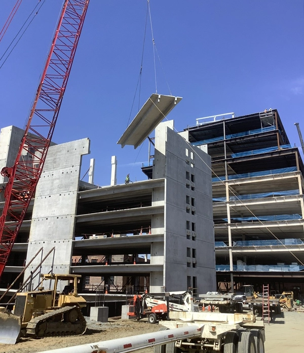 Precast double tee floor system installed by Concrete Erectors, Inc. on parking garage