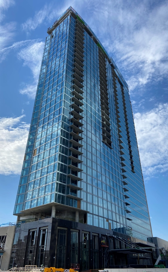 Structural precast concrete erection on multi-story high-rise project by Concrete Erectors, Inc.